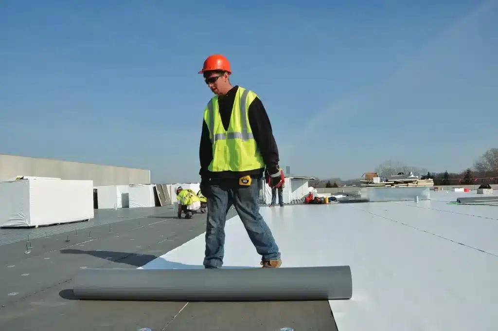Why Do Flat Commercial Roofs Develop Leaks and How Can Membrane Roofing Help